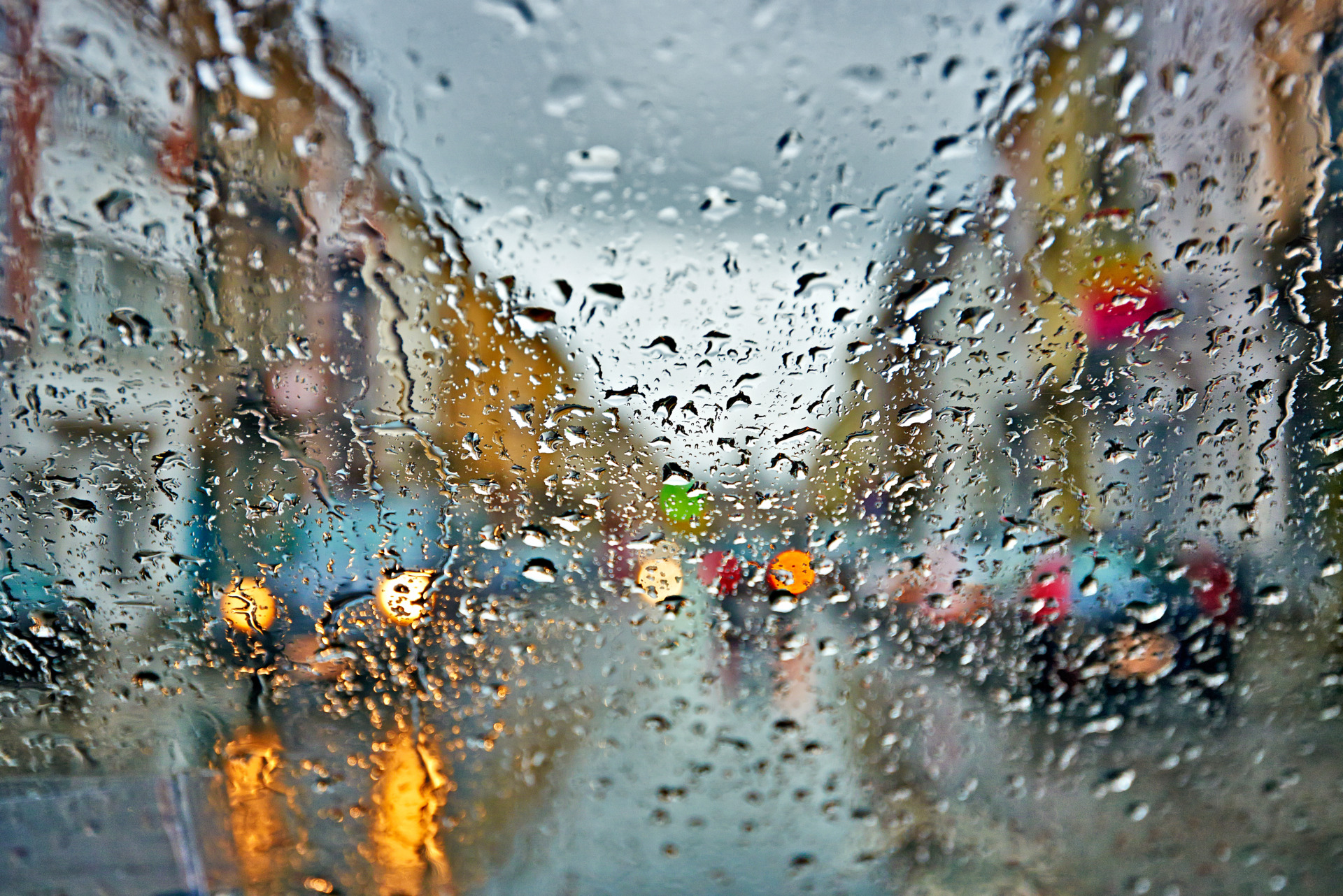 Car driving in rain and storm abstract background